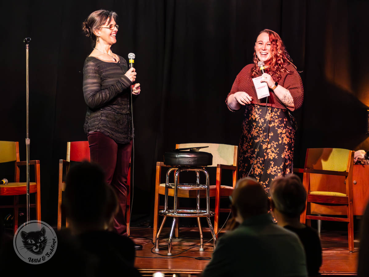 Wild & Sublime Chicago Dec 9, 2023 - Andie Baumgartner, founder of Rowan Tree, telling the audience about their latest trans initiative.